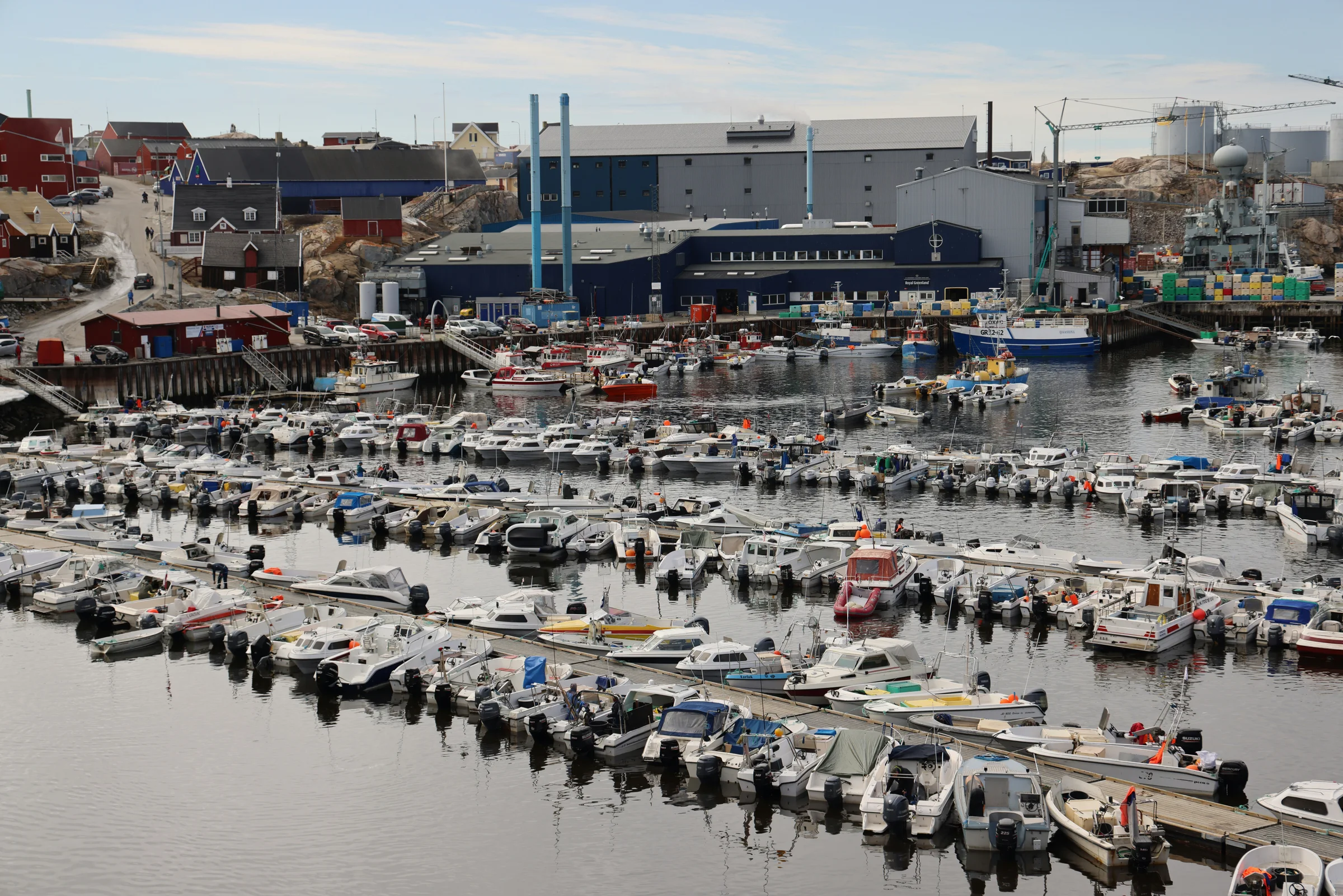 Fishing boats and waterfront buildings at Ilulissat harbor